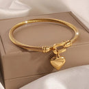 Pulseira Feminina em Aço Inoxidável Dourada com Pingente de Coração