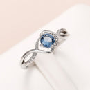 Anel Prateado com Zircônia Azul